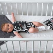RPC072_Raven Print Hydrofiel on bed SWC071_Carbon and SBC001_White_SLC001_White_laying.jpg.800×800.fill.ffffff